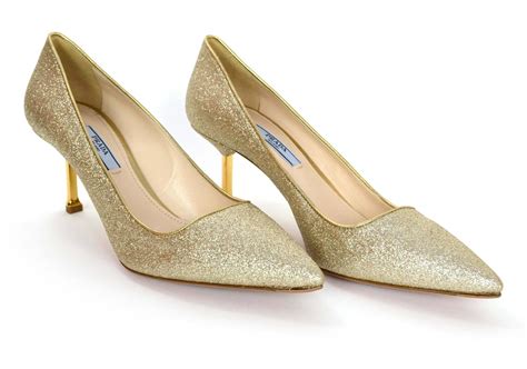 prada gold pumps|Prada high heel pumps.